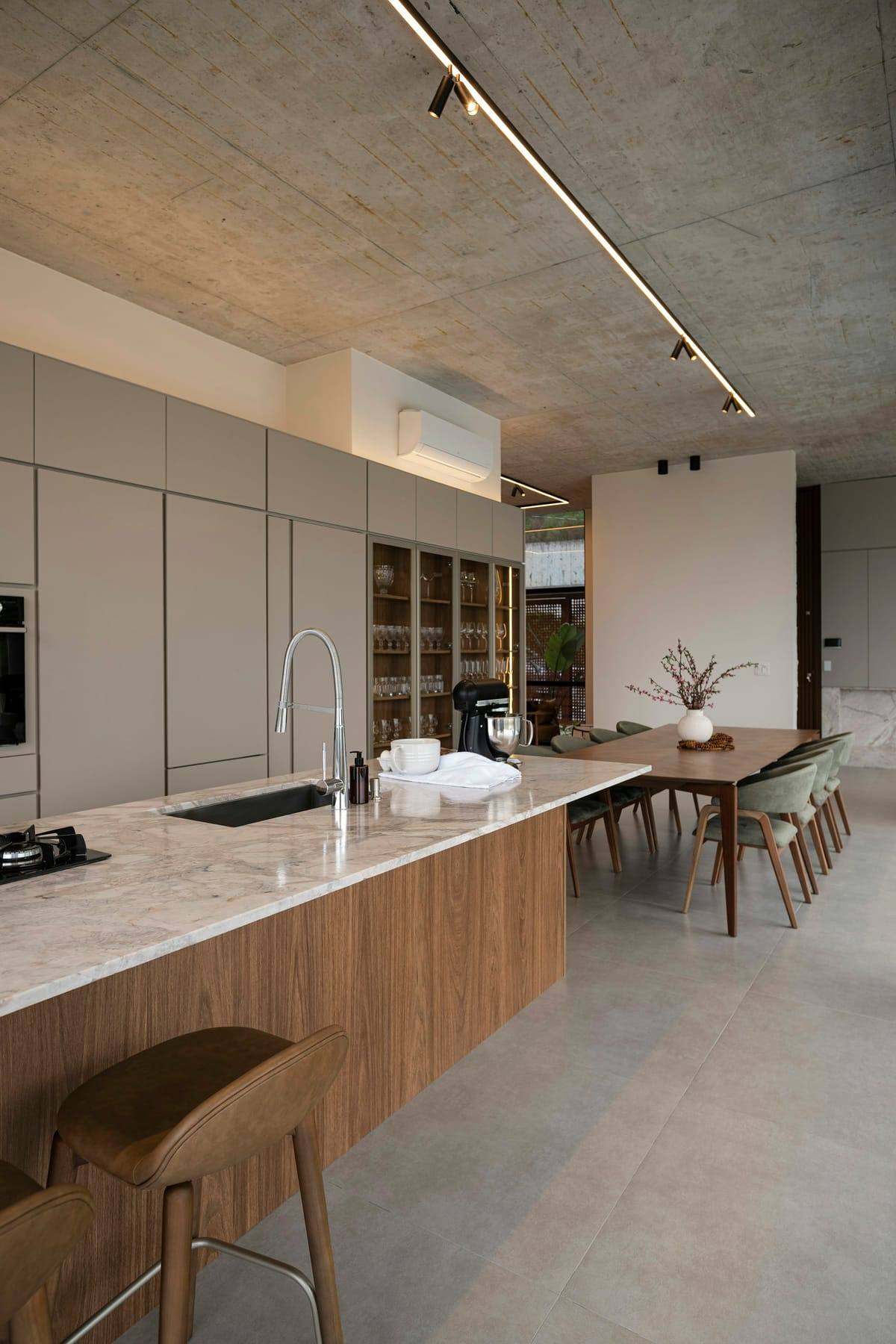 Kitchen island with stools and pendant lights